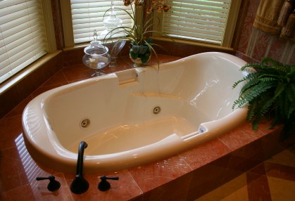 Bathtub plumbing by Conlon Plumbing.